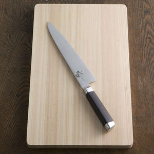 210mm Kai Seki Magoroku Gyuto Knife with Damascus pattern, designed for versatile kitchen use