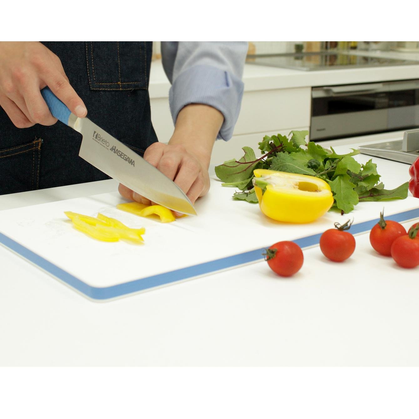 Hasegawa Antibacterial Lightweight Cutting Board Karma Kun, medium size, textured surface, ideal for daily food preparation.