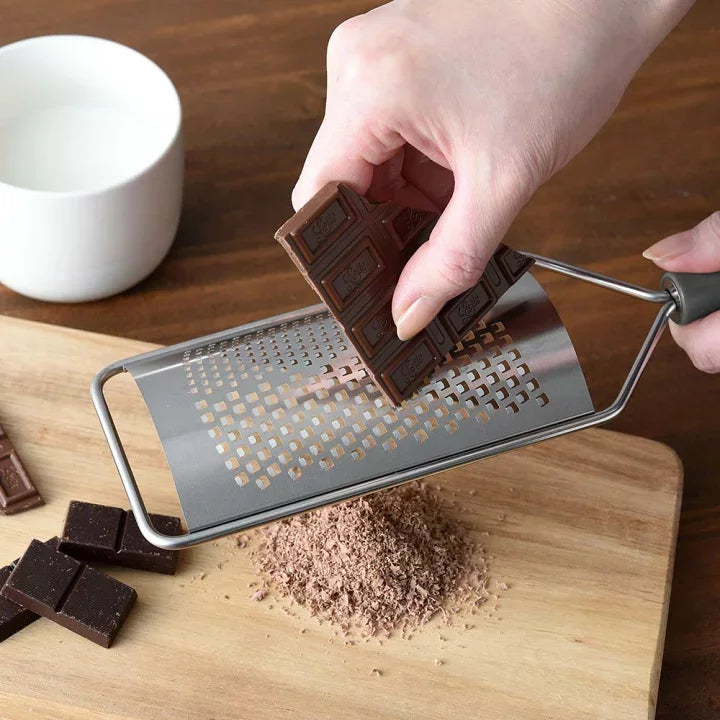 Arnest Cheese Grater in handheld size, ergonomic handle, perfect for cheese and vegetables