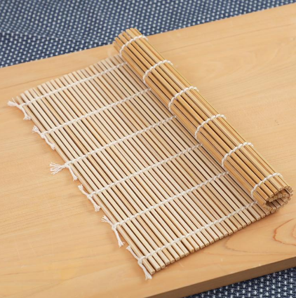 24cm Natural Bamboo Sushi Rolling Mat, durable eco-friendly bamboo, offering precise rolling for sushi lovers.