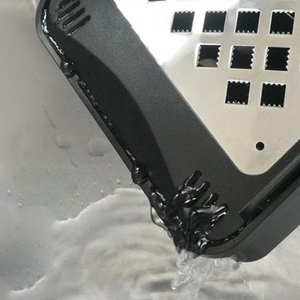 Stainless steel Wada Shoten Pro Oroshi X Grater featuring drainer function, offering clean prep for home cooks