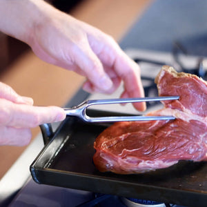 Carving Fork and Steak Knife Set with natural wood handles, crafted for refined meat presentation