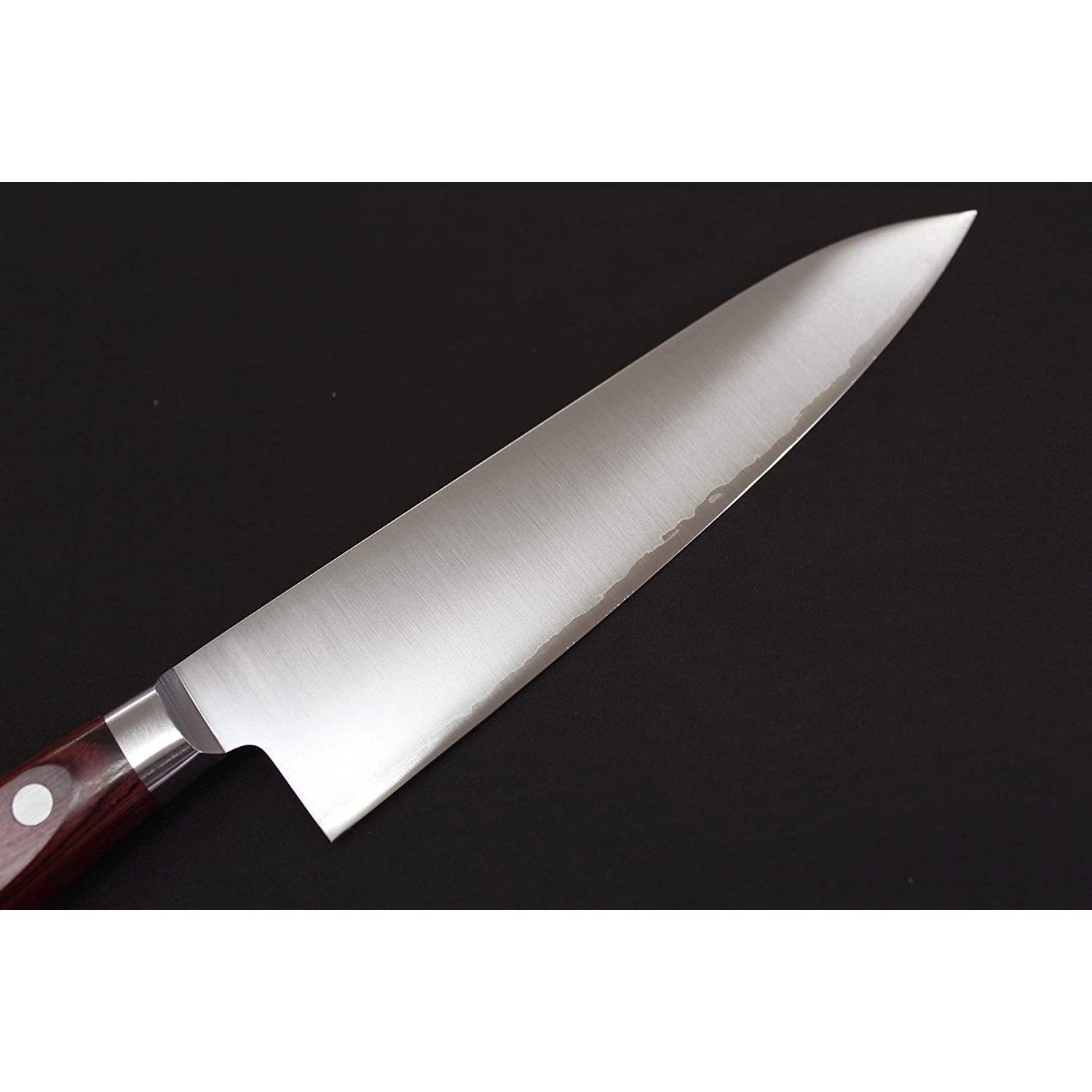 180mm Takamura Hamono High Speed Steel Gyuto Knife with artisan Japanese finish, offering refined performance.