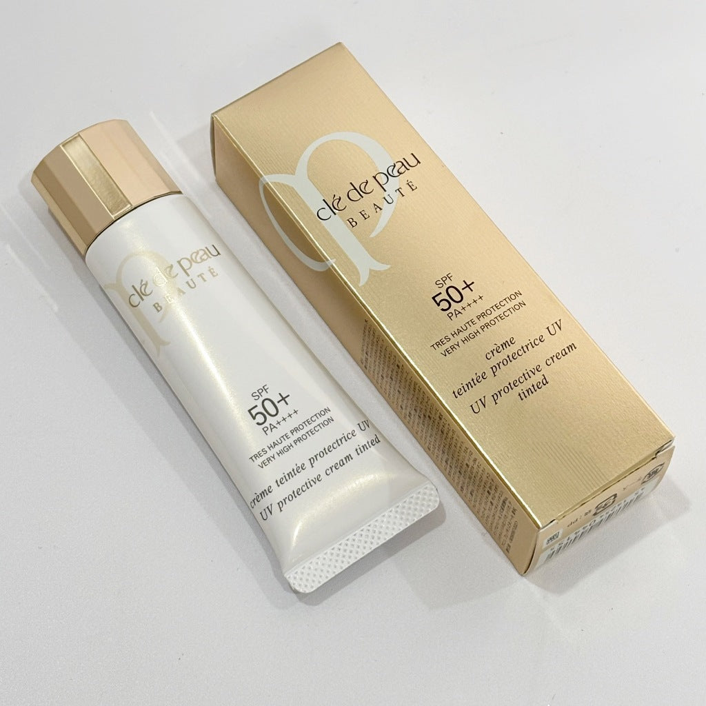 30ml Clé de Peau Beauté UV Protective Cream Tinted SPF50+ PA++++ Ivory with antioxidant support, offering radiance for all-day wear