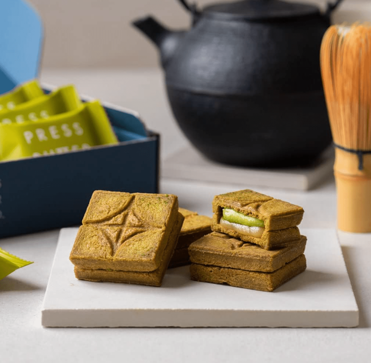 9-piece PRESS BUTTER SAND Uji Matcha, individually wrapped cookies, designed for gifting.