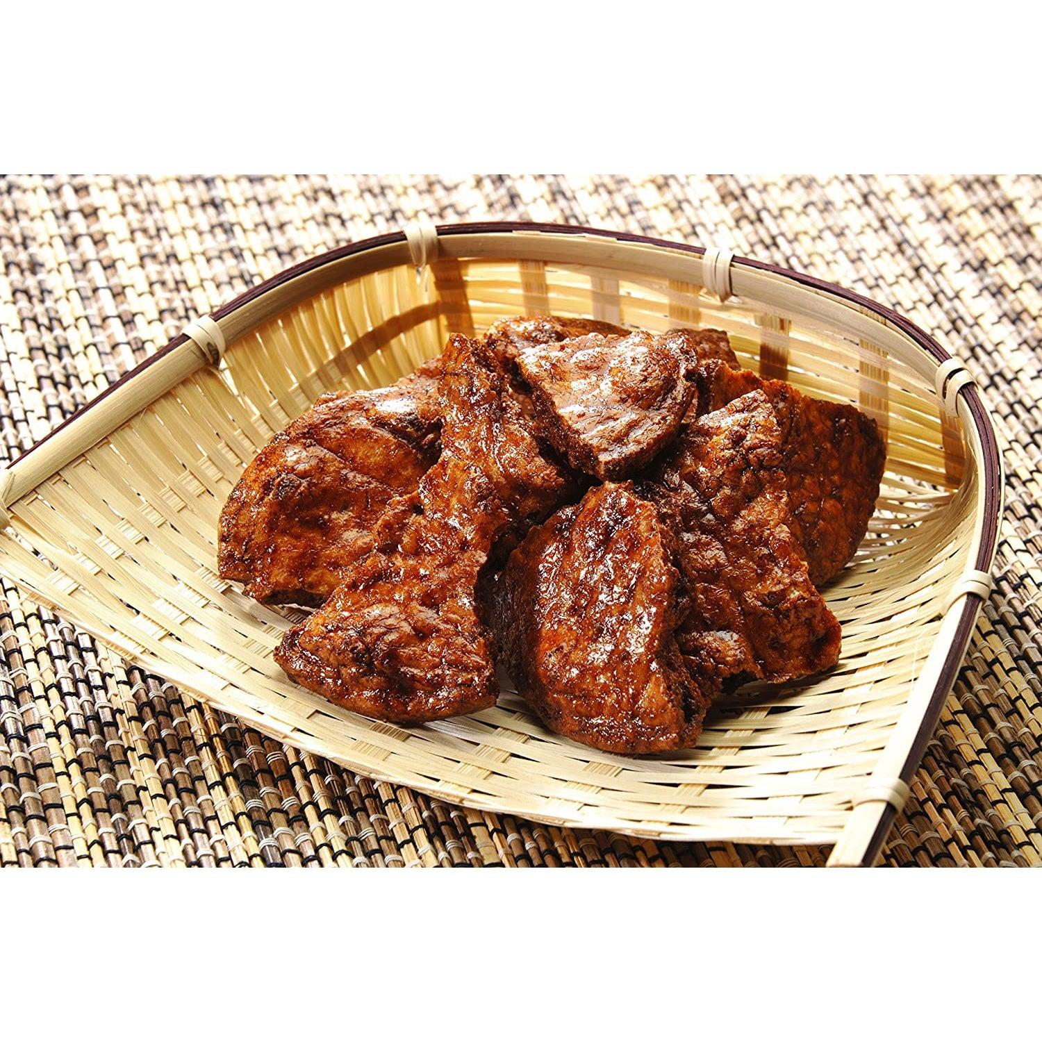 Close-up of Kameda Double Dipped Soy Sauce Senbei Rice Crackers 120g (Pack of 3), featuring broken artisan style for varied crunch