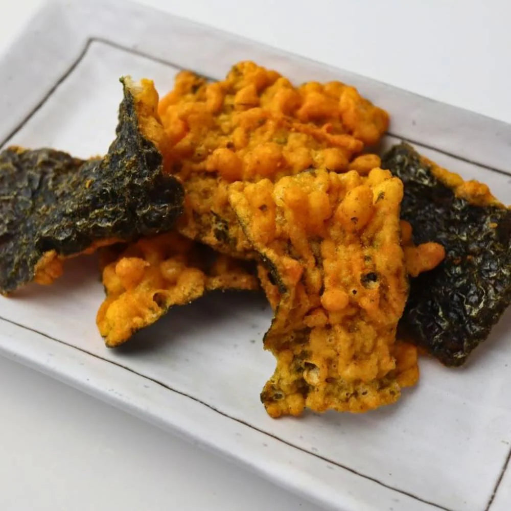 70g Daiko Noriten Biriri Kun Extra Spicy Togarashi Tempura Seaweed Chips (Pack of 12) with tempura nori, offering crunchy texture for gatherings