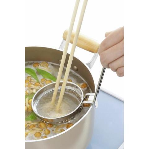 Strainer in use in pot, straining miso paste into broth, model 29343