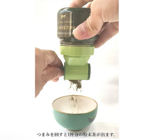 30 g Issen Gyokuro tin open showing vibrant green powder inside, ready to brew.

